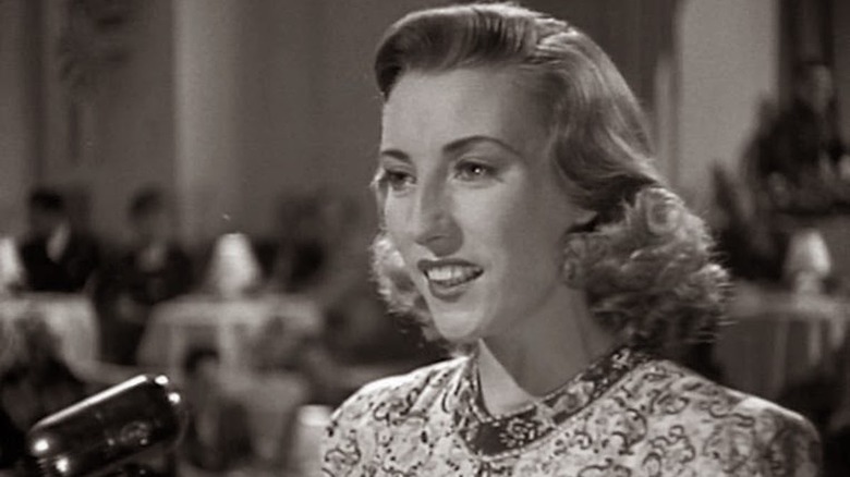 Vera Lynn smiles and sings