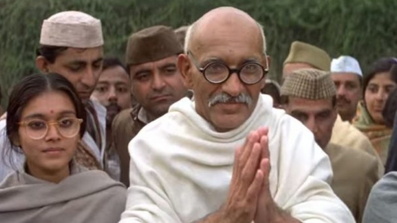 Ben Kingsley as Gandhi leading prayers