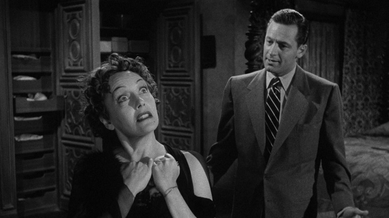 Joe Gillis pleading with Norma Desmond