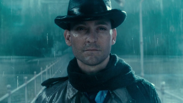 Nick Carraway drenched with rain