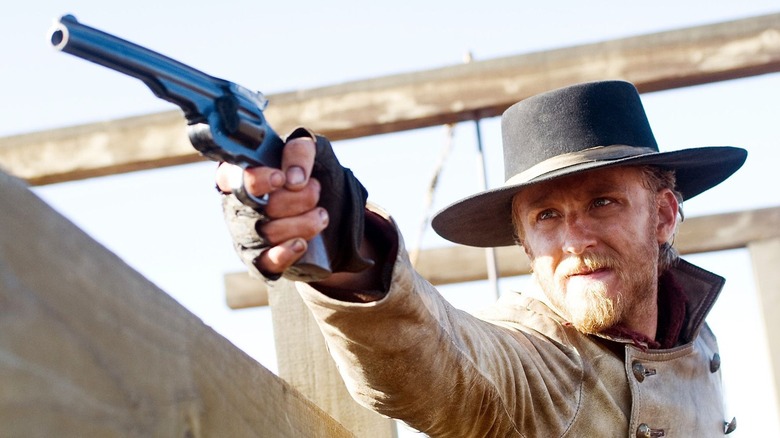 Charlie Prince points a revolver in 3:10 to Yuma (2007)