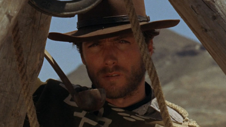 The Man with No Name squints into the distance in a A Fistful of Dollars