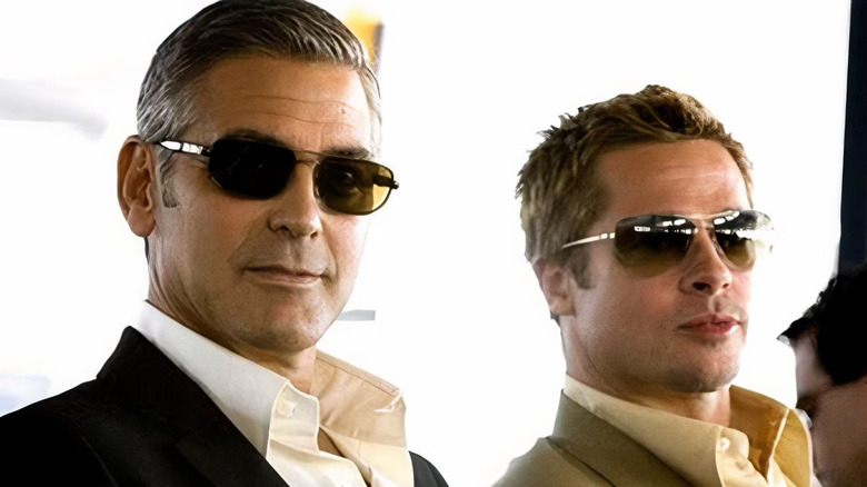 Danny Ocean and Rusty Ryan observe events in Ocean's Eleven