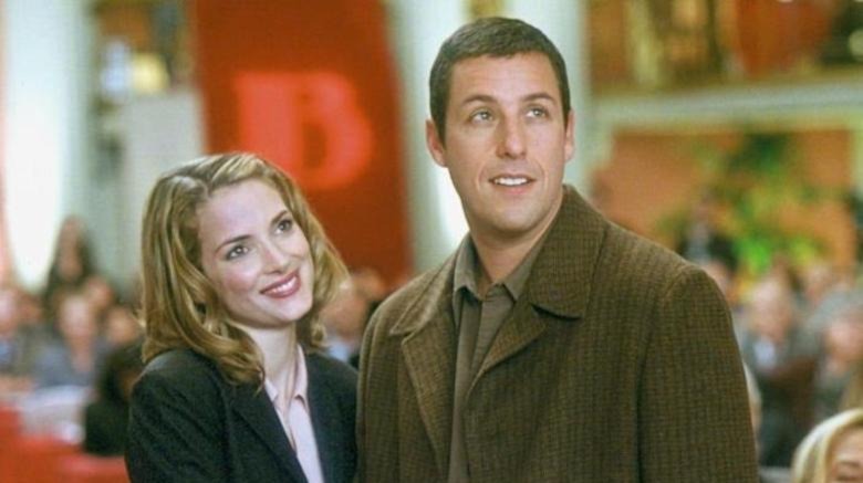 Longfellow Deeds and Babe Bennett smile up at someone in Mr. Deeds