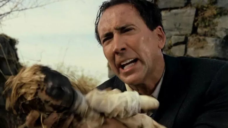 Nicolas Cage screams at a doll in The Wicker Man