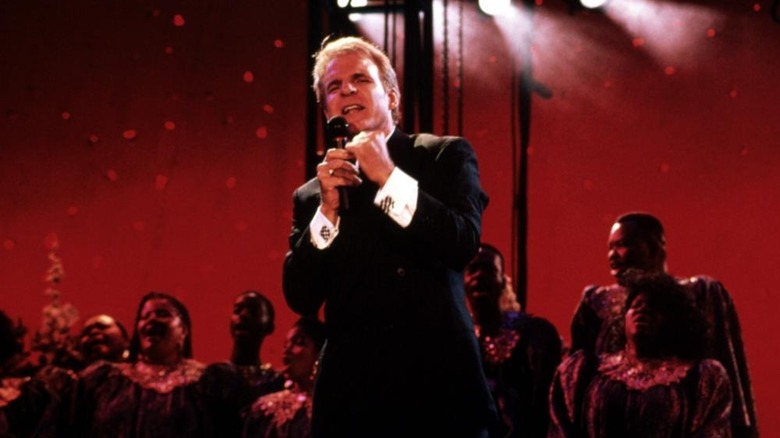 Steve Martin onstage with choir