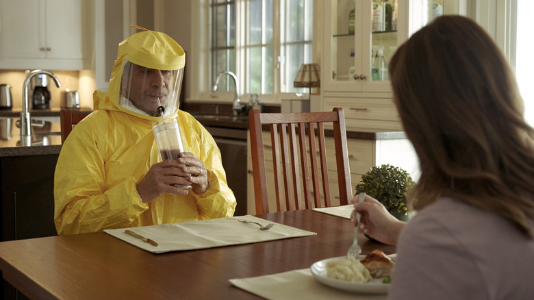 Tony Shalhoub wearing HAZMAT suit 