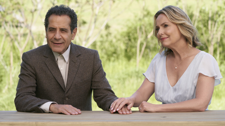 Tony Shalhoub, Melora Hardin holding hands