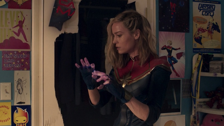 Carol Danvers looks at her hands 