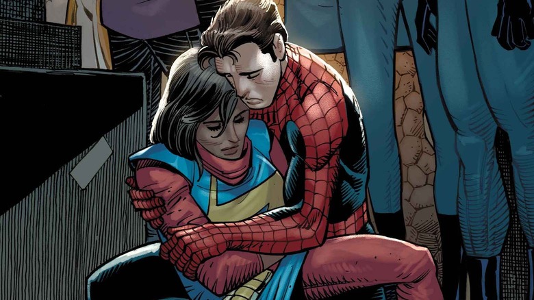 Peter Parker holding Ms. Marvel