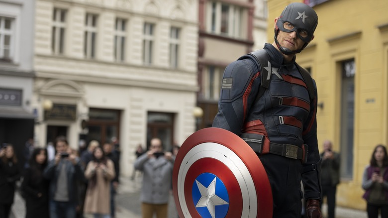 Wyatt Russell holding Captain America shield