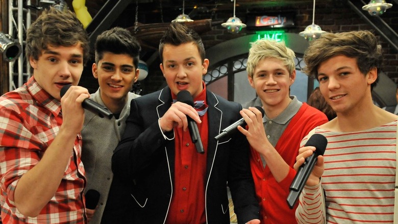 Gibby with four members of One Direction on iCarly