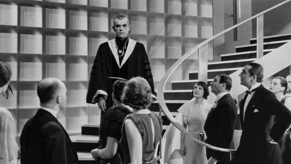 Boris Karloff on stairs