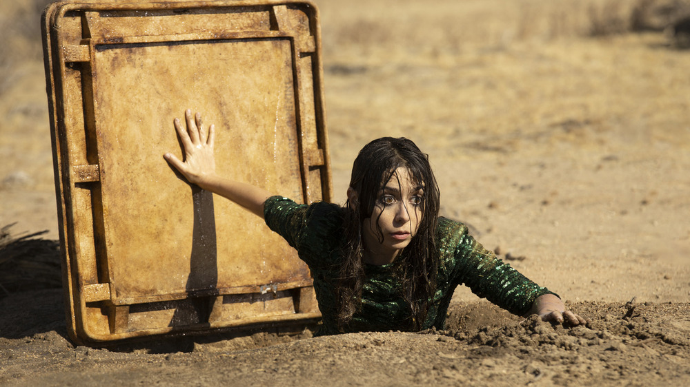 woman emerges from desert hideout