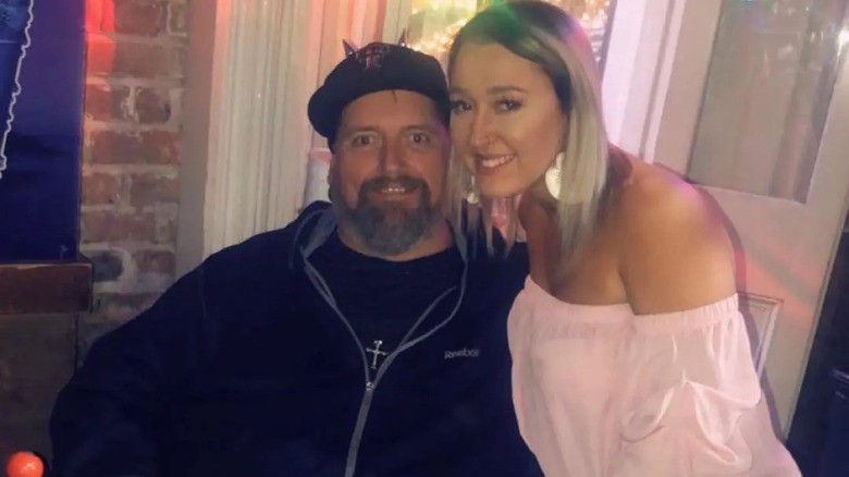 Donald Shelton posing with young woman