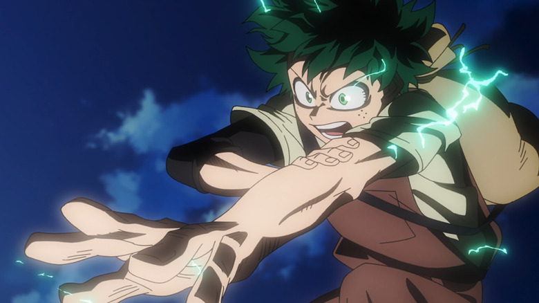 Deku in air holding left arm