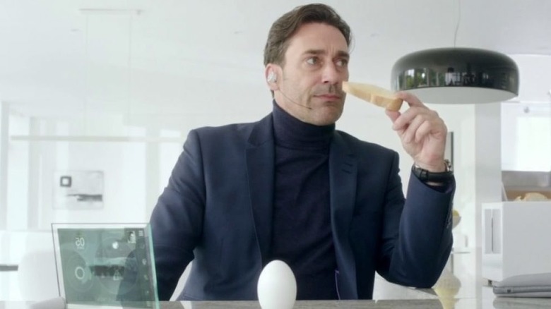 Jon Hamm holding toast