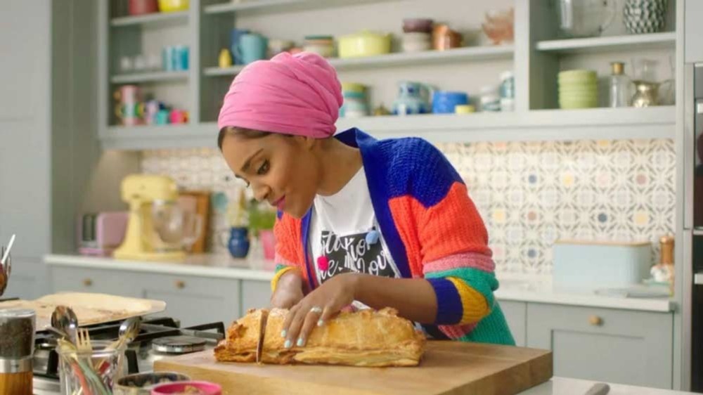 Nadiya Hussain slices into a loaf