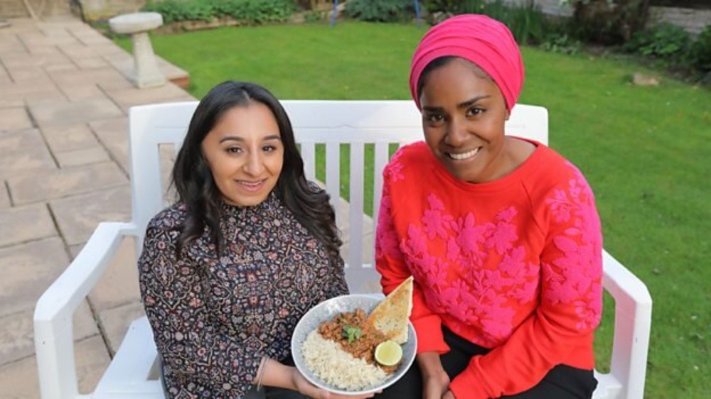 Nadiya Hussein sits with a guest