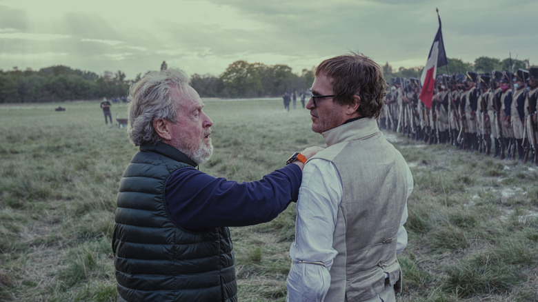 Ridley Scott Joaquin Phoenix standing