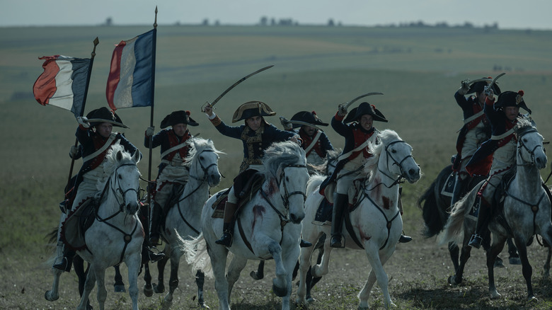 Napoleon leading soldiers in battle