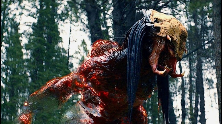 Predator half cloaked and screaming