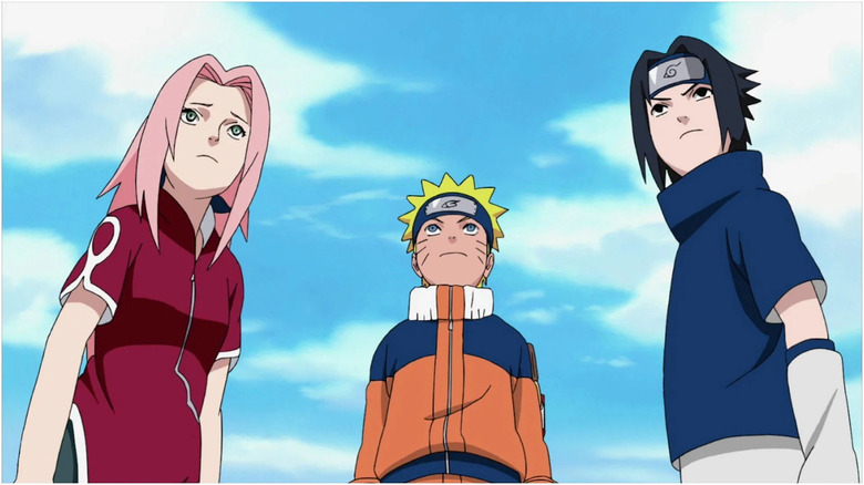 Sakura, Naruto, and Sasuke looking determined