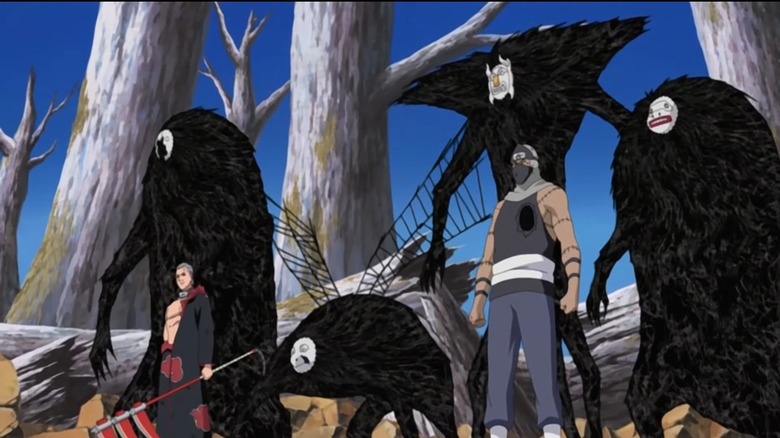 Hidan and Kakuzu standing with heart creatures