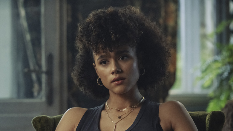 Nathalie Emmanuel sitting in "Army of Thieves"