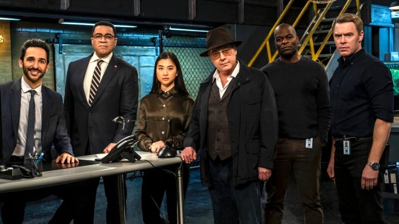 Red Reddington stands with FBI Task Force 