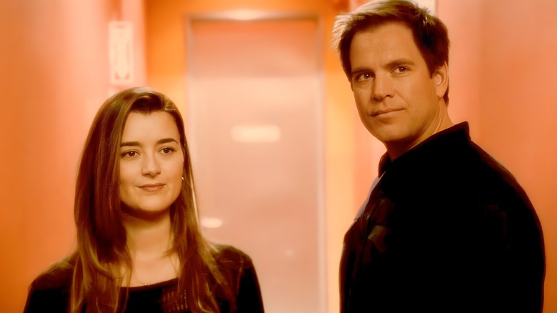 Tony and Ziva staring