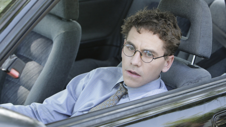 Brian Dietzen sitting in car on NCIS