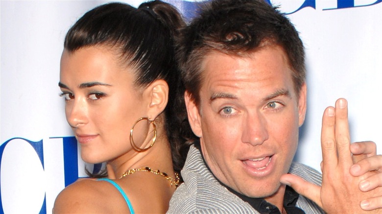 Cote de Pablo and Michael Weatherly pose together