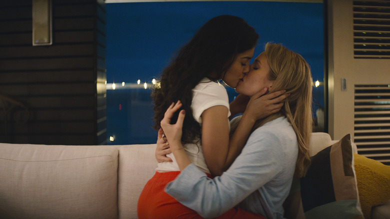 Yasmine Al-Bustami as Lucy Tara and Tori Anderson as Kate Whistler looking loved up