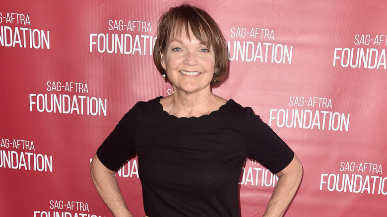 Pamela Reed smiling at event