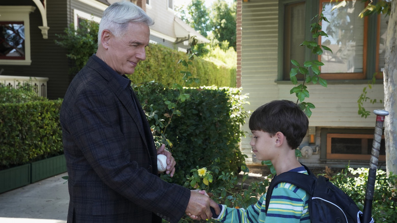 Gibbs and Phineas shaking hands