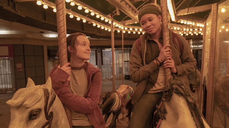 Riley and Ellie on the carousel