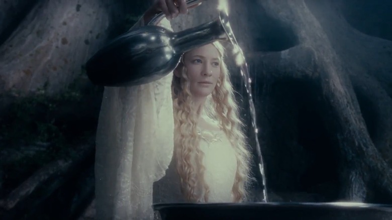 Galadriel pours water into Mirror