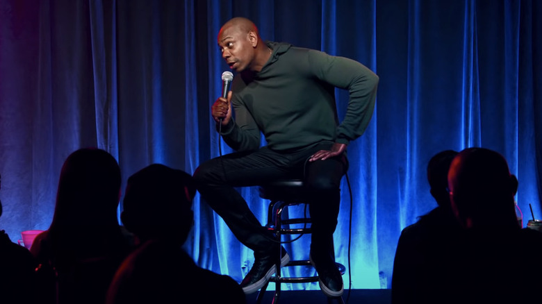 Dave Chappelle performing stand-up comedy