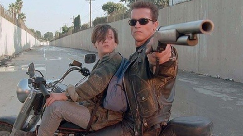 The Terminator with John Connor on a motorcycle