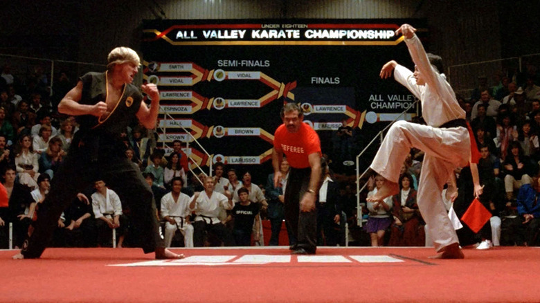 Johnny Lawrence and Daniel LaRusso fighting