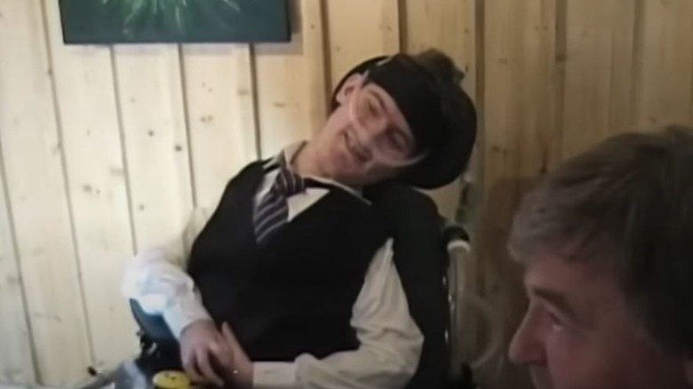 Smiling Mats Steen is sitting in a wheelchair