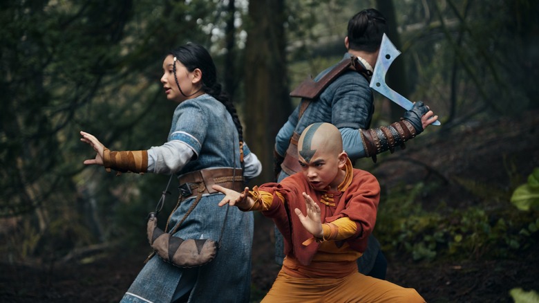 Aang, Katara, and Sokka in forest