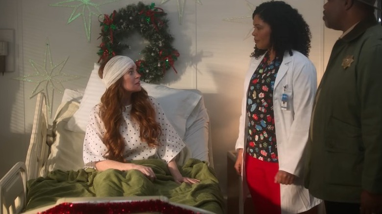 Sierra Belmont in a hospital bed in Falling for Christmas