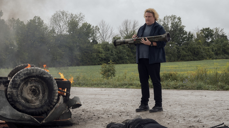 A CIA operative holding a bazooka 