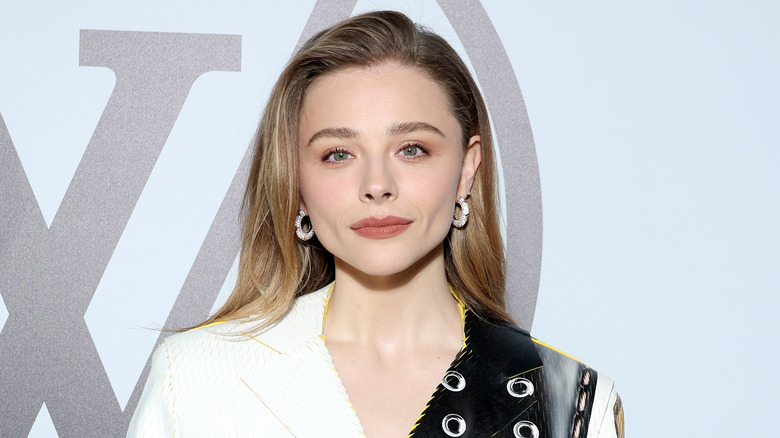 Chloe Grace Moretz wearing black and white suit