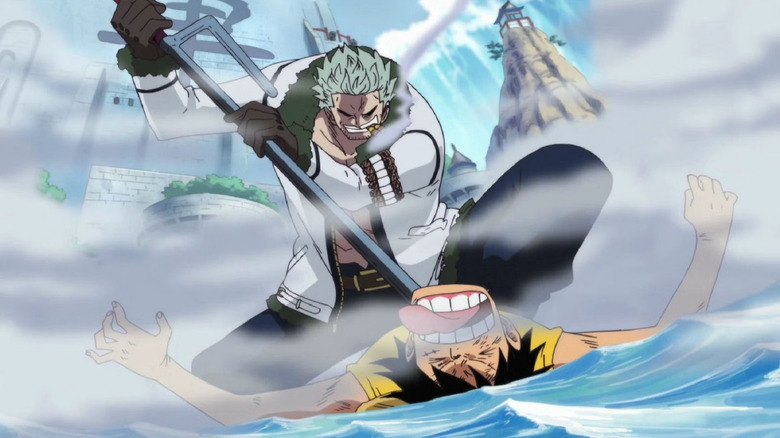 Smoker pinning Luffy with jitte