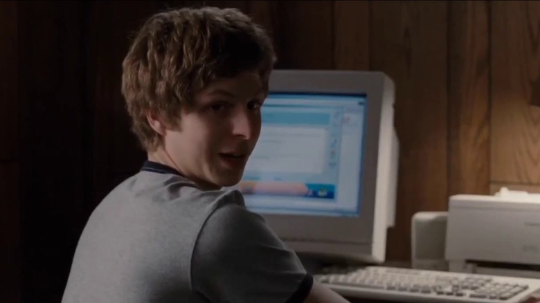 Scott Pilgrim types at a computer