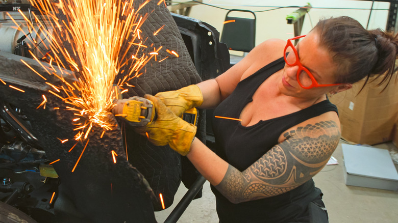 Jamie working on a car