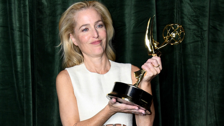 ECU of Gillian Anderson holding Emmy 2021